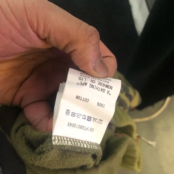 A BATHING APE GREEN 1ST CAMO SWEATS W/ EMBROIDERED LETTERS IN WHITE SZ. M